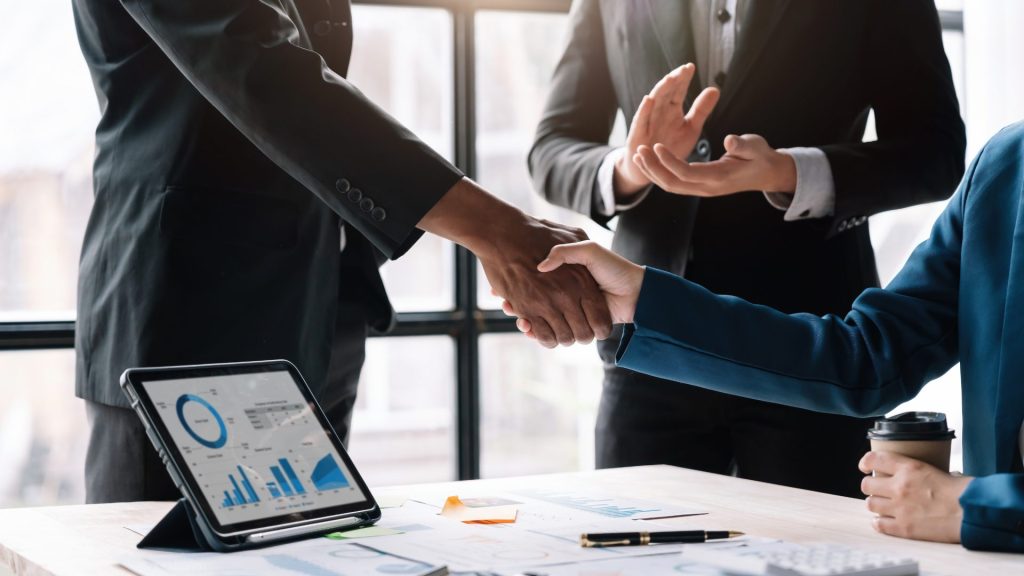 Poignée de mains lors d'une acquisition d'entreprise